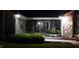 Evening shot of the well decorated, stone accented front porch with plants and furniture at 12681 E 79Th St, Indianapolis, IN 46236