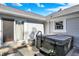 Close up of the hot tub on the back patio with a sliding door for easy access at 12681 E 79Th St, Indianapolis, IN 46236