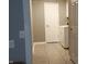 Bright laundry room with tile floors and modern washer and dryer at 12681 E 79Th St, Indianapolis, IN 46236
