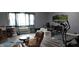 Cozy living room featuring modern exercise equipment and ample natural light at 12681 E 79Th St, Indianapolis, IN 46236