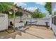 Outdoor patio with pergola, dining table, hammock and grill at 13063 E 131St St, Fishers, IN 46037