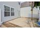 Backyard patio featuring a walkout sliding door and a partial pergola at 13063 E 131St St, Fishers, IN 46037