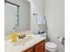 Half bath with white sink, marble countertop, mirror and towel rack at 13063 E 131St St, Fishers, IN 46037