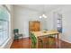 Cozy dining room with hardwood floors and natural light at 13063 E 131St St, Fishers, IN 46037