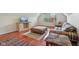 Cozy living room with wood floors, bright window, TV, and comfortable furniture at 13063 E 131St St, Fishers, IN 46037