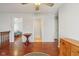 Upstairs loft with hardwood floors and hallway entrances to bedroom and bath at 13063 E 131St St, Fishers, IN 46037