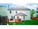 Back exterior features a deck and well-maintained siding, offering a great outdoor space at 13295 Patriotic Way, Fishers, IN 46037