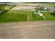 Expansive aerial view of rural property with fields and outbuildings at 133 W Us Highway 52, Fountaintown, IN 46130