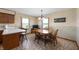 Inviting dining room featuring a wood table, chairs, and natural lighting at 133 W Us Highway 52, Fountaintown, IN 46130