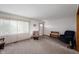 Comfortable living room with carpet, and comfortable seating at 133 W Us Highway 52, Fountaintown, IN 46130