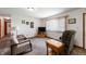 Living room with carpet, comfortable seating, and a TV at 133 W Us Highway 52, Fountaintown, IN 46130