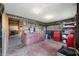 A versatile room featuring an attached garage, perfect for storage or as a functional workspace at 133 W Us Highway 52, Fountaintown, IN 46130