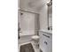Bright bathroom showcasing a white shower and vanity area with modern matte black hardware at 13309 Carmichael Ln, Carmel, IN 46074