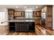 Kitchen with wooden cabinets, stainless steel appliances, and kitchen island at 13309 Carmichael Ln, Carmel, IN 46074