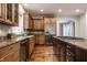 Kitchen featuring granite countertops, stainless steel appliances, and a central island at 13309 Carmichael Ln, Carmel, IN 46074