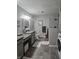 This bathroom has granite countertops, a walk-in shower and laundry hookups at 1515 Renee Dr, Plainfield, IN 46168
