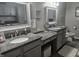 A bathroom features a double-sink vanity with granite countertops and neutral paint at 1515 Renee Dr, Plainfield, IN 46168
