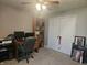 Bedroom featuring a ceiling fan, closet, and desk at 1515 Renee Dr, Plainfield, IN 46168