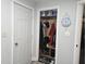 Hallway closet features plenty of storage space with clothes rack and shoe shelves at 1515 Renee Dr, Plainfield, IN 46168