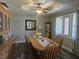 Inviting dining room featuring a wooden table, six chairs, and soft natural lighting at 1515 Renee Dr, Plainfield, IN 46168