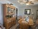 Traditional dining room featuring a wooden hutch, six-chair table, and natural light at 1515 Renee Dr, Plainfield, IN 46168