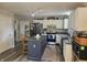 Inviting kitchen boasts white cabinets, a center island, and stainless steel appliances at 1515 Renee Dr, Plainfield, IN 46168