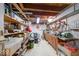 Basement workshop with shelves, pegboards, and various tools and equipment at 2150 Main St, Beech Grove, IN 46107