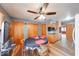 Dining area featuring a ceiling fan, table with seating, and wood flooring at 2150 Main St, Beech Grove, IN 46107