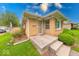 Inviting home with a tidy, stepped front porch and low-maintenance landscaping at 2150 Main St, Beech Grove, IN 46107