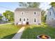 Backyard with a fire pit, deck and outdoor seating perfect for enjoying the outdoors at 2336 Sycamore St, Columbus, IN 47201