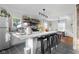 A newly renovated, open-concept kitchen with a marble breakfast bar and stainless appliances at 2336 Sycamore St, Columbus, IN 47201