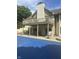 Backyard view of a home with a balcony overlooking a pool and patio at , Shelbyville, IN 46176