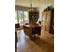 Charming dining room featuring hardwood floors, a large window, and wooden furniture at , Shelbyville, IN 46176