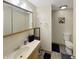 Bathroom featuring a vanity, mirror, and toilet, showcasing functionality and neutral decor at 2548 N Letterman Rd, Paragon, IN 46166