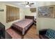 Cozy bedroom featuring a ceiling fan, stylish decor and a comfortable looking bed at 2548 N Letterman Rd, Paragon, IN 46166