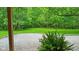 Inviting outdoor space with a charming view of a lush backyard surrounded by vibrant greenery at 2548 N Letterman Rd, Paragon, IN 46166