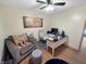 Functional office area features a desk, comfortable chair, accent chair, ceiling fan and natural light at 2548 N Letterman Rd, Paragon, IN 46166