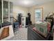 Utility room with water heater, storage solutions, and practical flooring at 2548 N Letterman Rd, Paragon, IN 46166