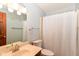 Bathroom with a sink, toilet, and shower with a curtain at 3126 Oakmont Dr, Lapel, IN 46051