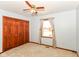 Bedroom featuring a ceiling fan, carpet, and closet at 3126 Oakmont Dr, Lapel, IN 46051