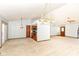 Bright and airy living room with ceiling fan and view of the front entryway at 3126 Oakmont Dr, Lapel, IN 46051