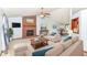 Bright living room showcasing a fireplace, comfortable seating, and an adjacent dining area at 3126 Oakmont Dr, Lapel, IN 46051