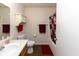 Well-maintained bathroom featuring a vanity, toilet, and shower with decorative curtain at 320 Red Tail Ln, Indianapolis, IN 46241