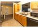Functional kitchen featuring ample counter space, a stainless steel sink, and a seamless connection to the living area at 320 Red Tail Ln, Indianapolis, IN 46241