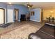 Inviting living room with an open layout, hardwood floors, comfortable seating, and a view of the dining area at 320 Red Tail Ln, Indianapolis, IN 46241