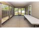 A screened-in patio, perfect for outdoor gatherings and relaxation at 320 Red Tail Ln, Indianapolis, IN 46241