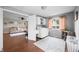 Well-lit laundry room with white cabinets, modern washer and dryer, and decorative accents, providing a functional and stylish space at 3334 Old Field Ln, Columbus, IN 47203