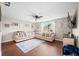 Spacious living room featuring a large sectional sofa, stylish rug, and lots of decor creating a welcoming space at 3334 Old Field Ln, Columbus, IN 47203