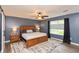 Comfortable bedroom with a plush bed, neutral rug, and ample natural light at 35 Valley View, Brownsburg, IN 46112