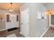 A welcoming entryway features wood floors and neutral wall decor at 35 Valley View, Brownsburg, IN 46112